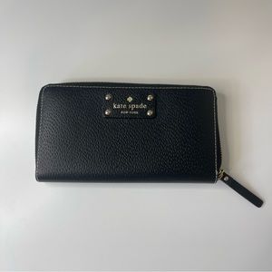 Kate spade wallet. Black that zips & has pink & beige interior.